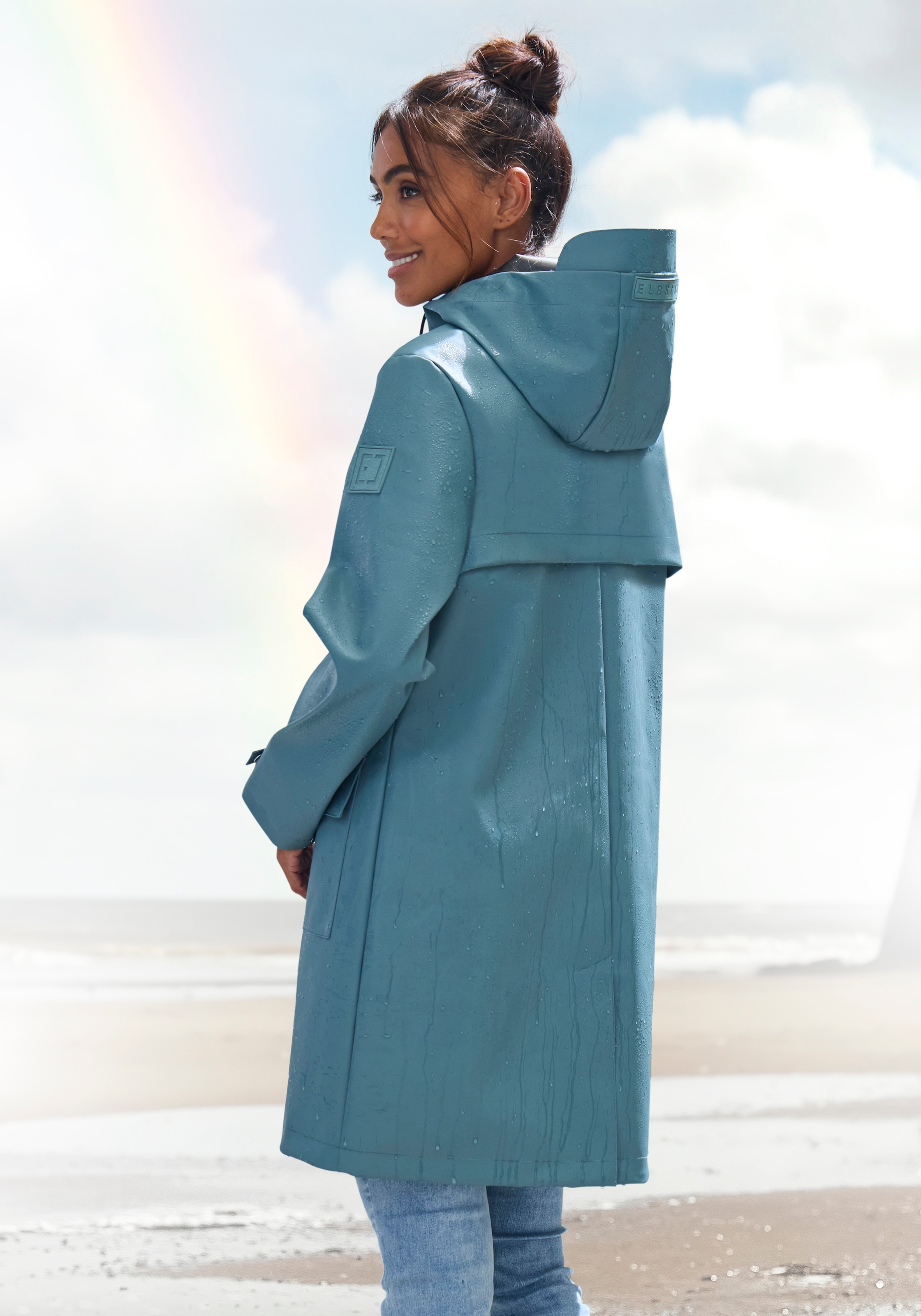 Elbsand Regenjacke mit Kapuze Mesh-Einsatz unter der Rückenpasse für ausreichende Belüftung