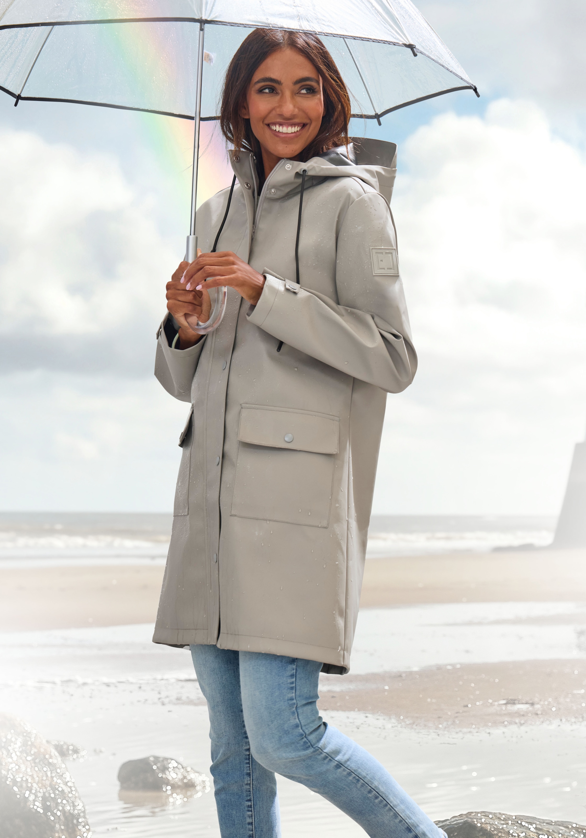 Elbsand Regenjacke mit Kapuze Mesh-Einsatz unter der Rückenpasse für ausreichende Belüftung