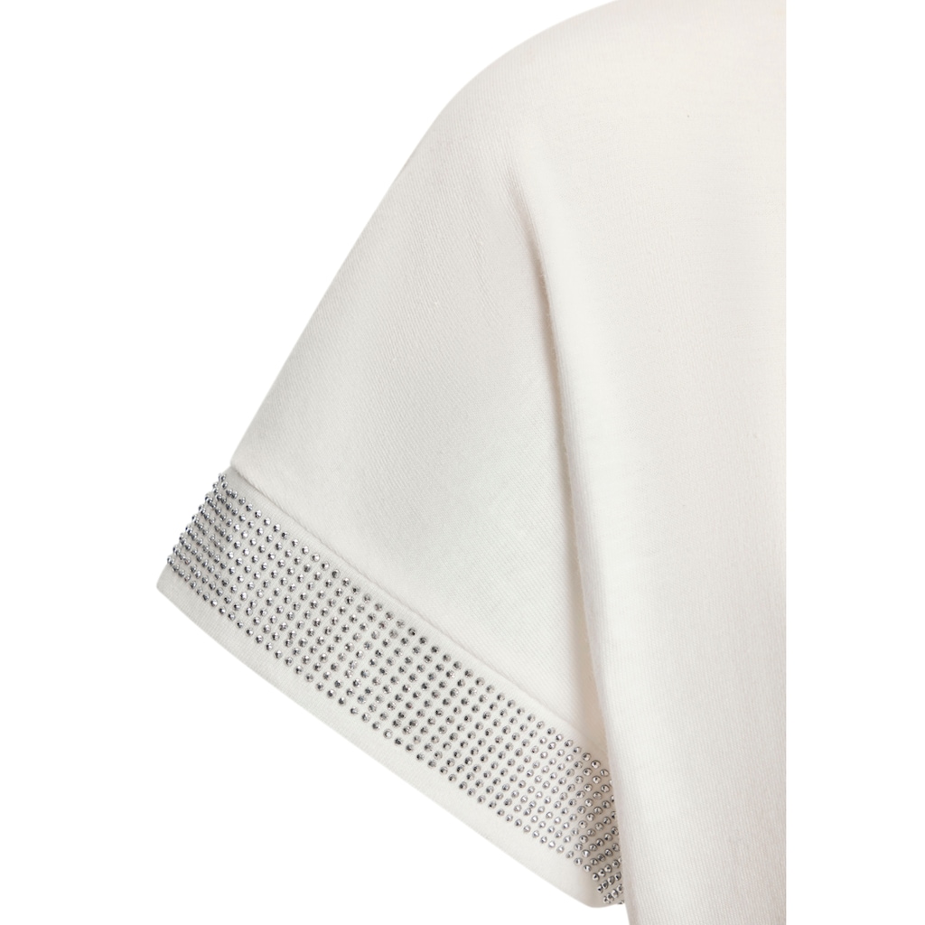 LASCANA Kurzarmshirt »mit glitzernem Strass-Design am Arm«, aus weicher Baumwoll-Qualität