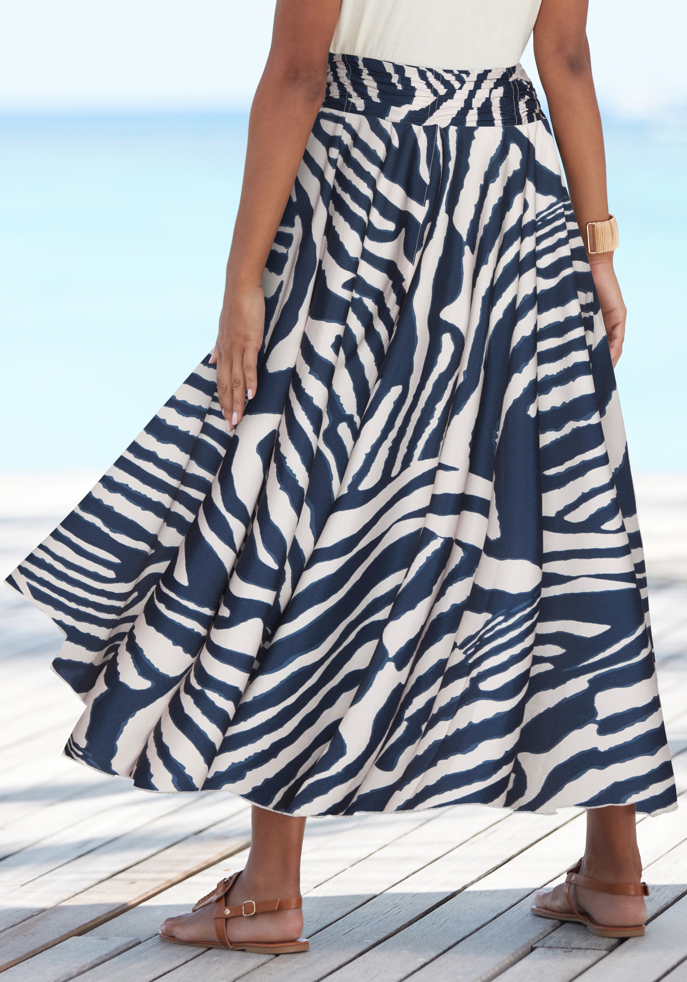LASCANA Jupe-culotte »mit extra weitem Bein« avec imprimé intégral, culotte, pantalon léger d'été, pantalon de plage, pantalon à enfiler
