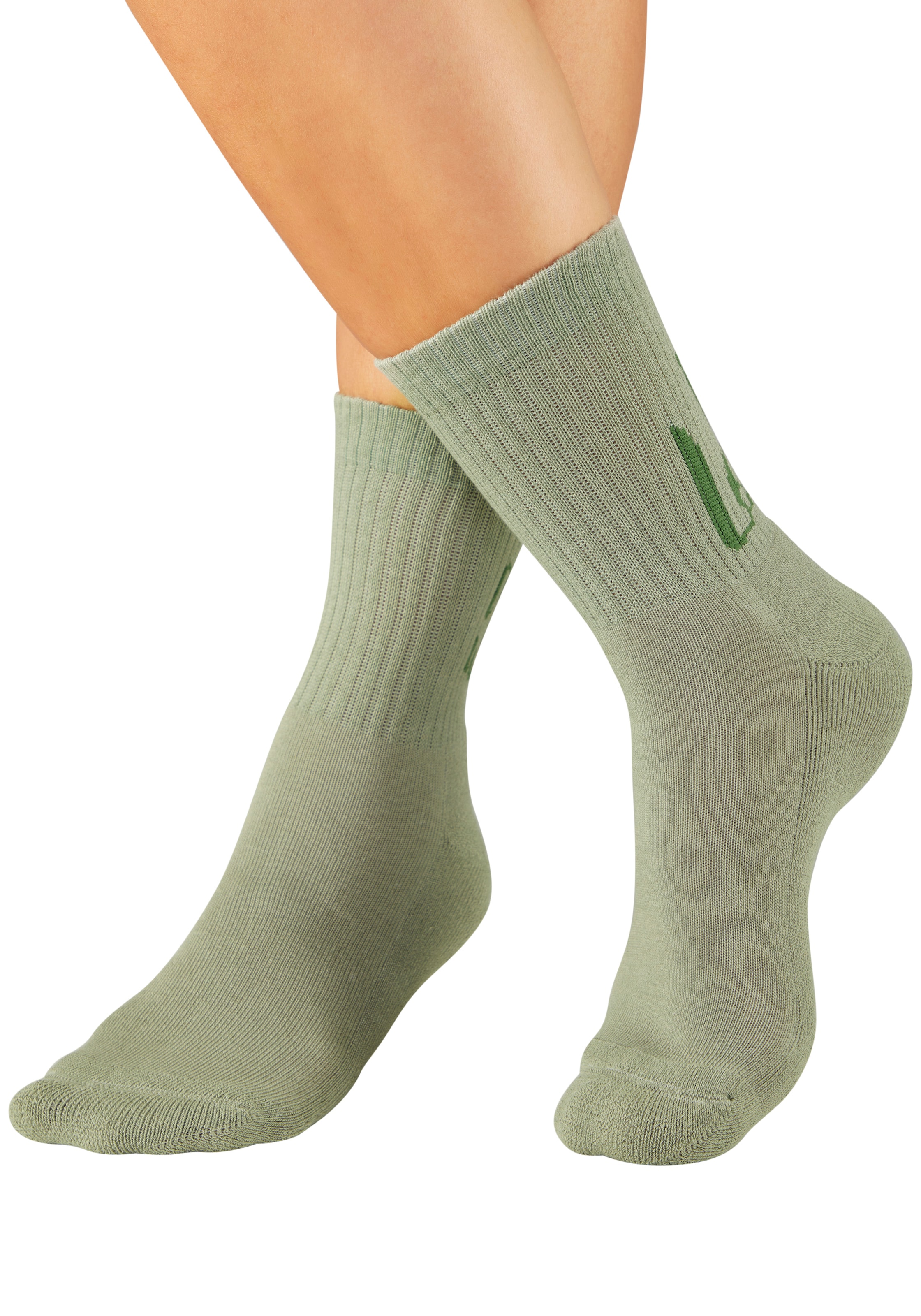 H.I.S Chaussettes de tennis »Damen Sportsocken daily socks« Paquet, 7 Couple tlg. avec du molleton bouclé au pied et des inscriptions attrayantes