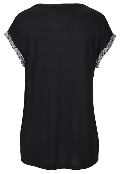 Shorty LASCANA. Luxueux et raffiné, au design noir-blanc, identique à celui du T-shirt.