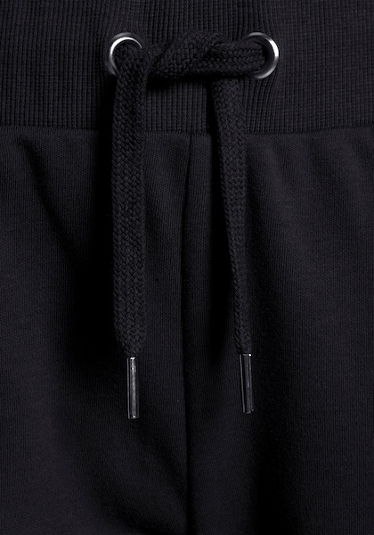 Bench : pantalon détente avec imprimé de la marque sur le côté et mesh